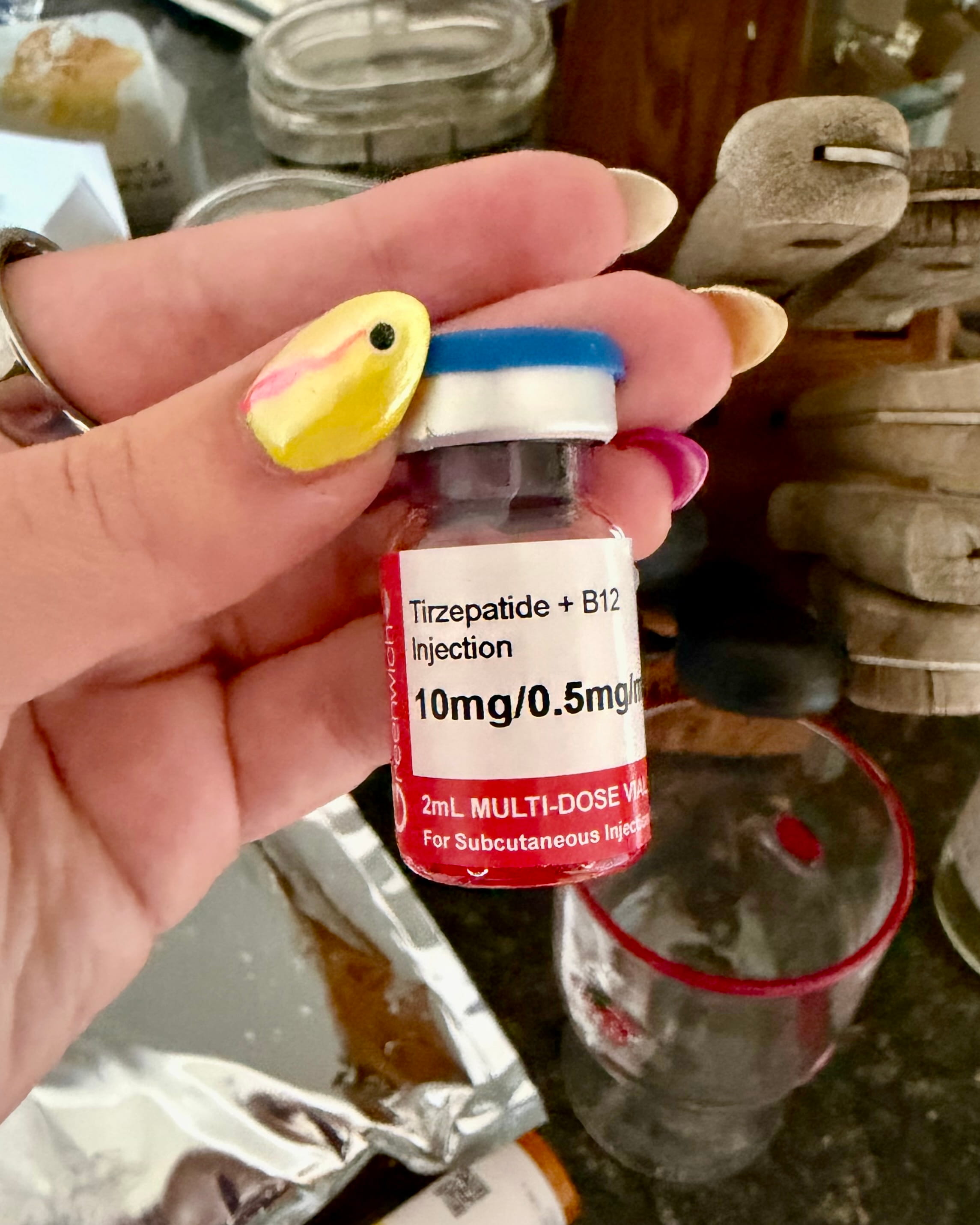 Vial label reading compounded Tirzepatide plus B12 Injection, 10mg/0.5mg/mL, 2mL multi-dose vial, made by Greenwich