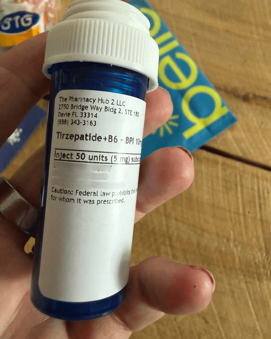 Prescription bottle label from The Pharmacy Hub 2 LLC, Davie, Florida, for Tirzepatide+B6 with patient details blurred