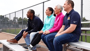 four-people-in-stands.png