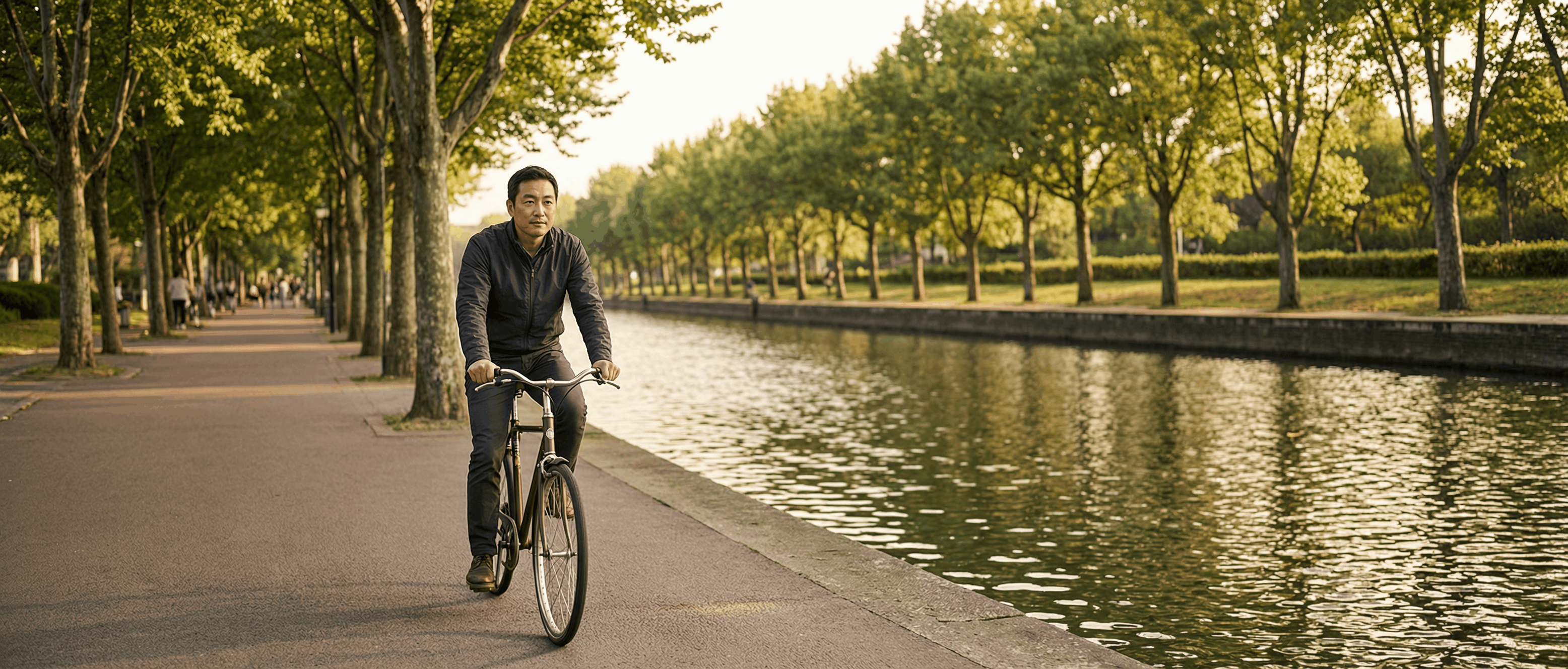 man-riding-bike-at-park.png