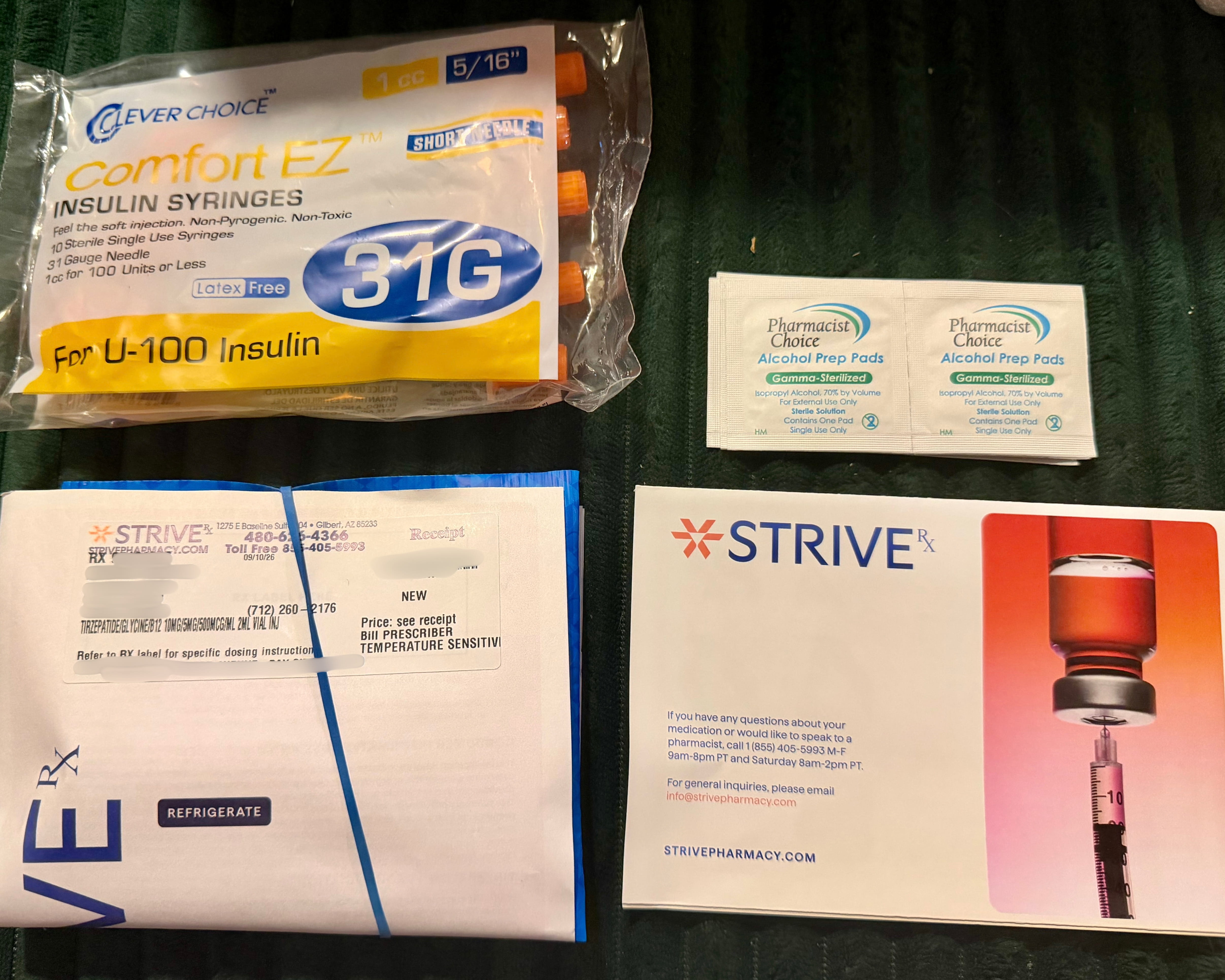 Clever Choice Comfort EZ 31 gauge insulin syringes, Pharmacist Choice alcohol prep pads, the Strive receipt, and the pharmacist contact card