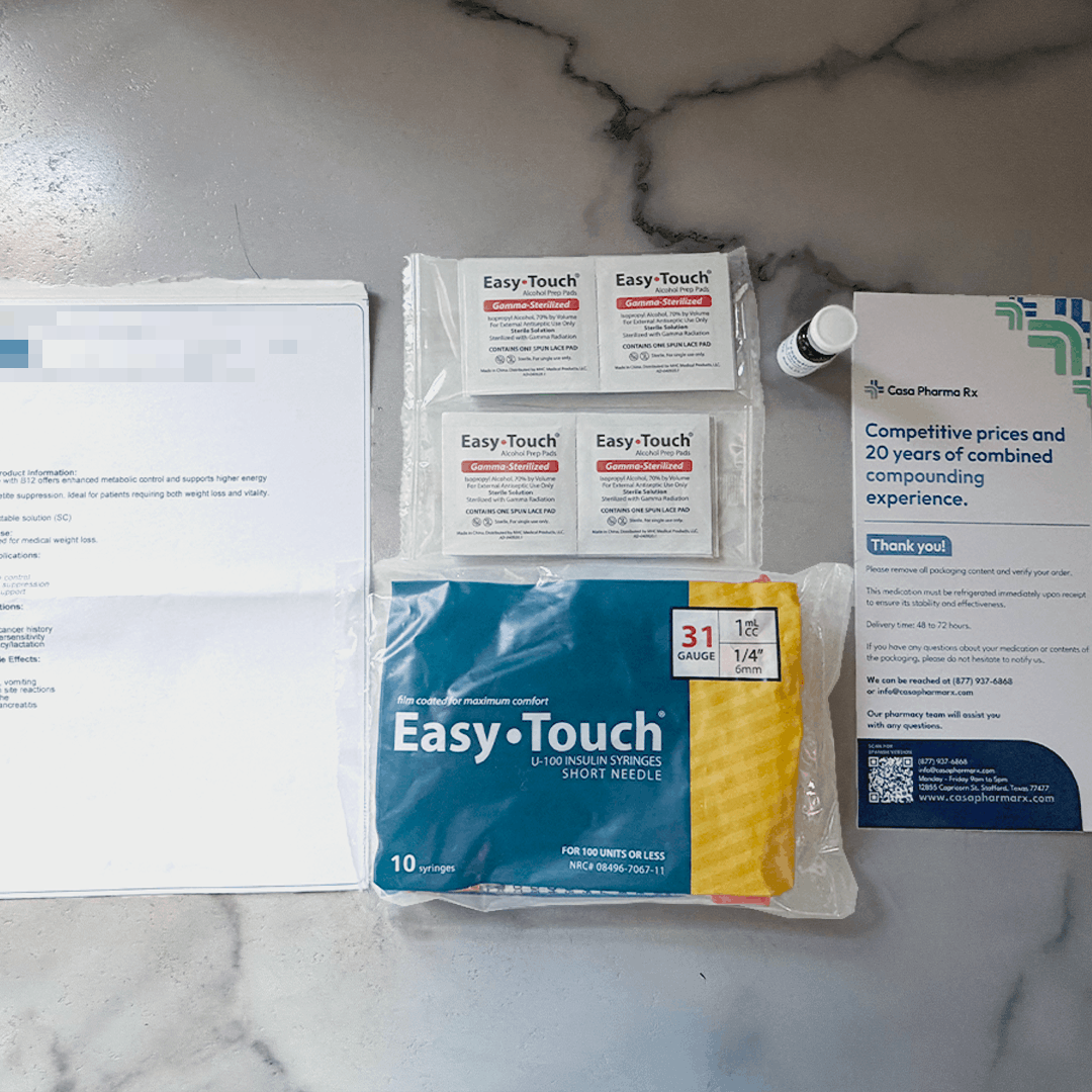 TrimRX order laid out: medication guide, alcohol prep pads, insulin syringes, vial, and CasaPharmaRx card