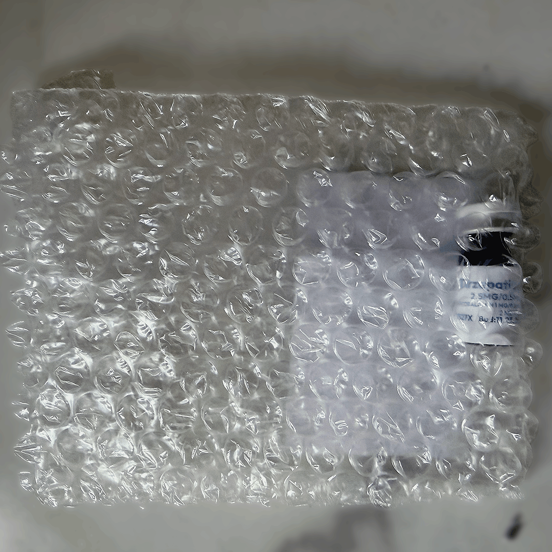 TrimRX tirzepatide vial protected only by a soft bubble wrap pouch inside the box