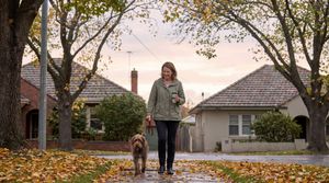 woman-walking-her-dog