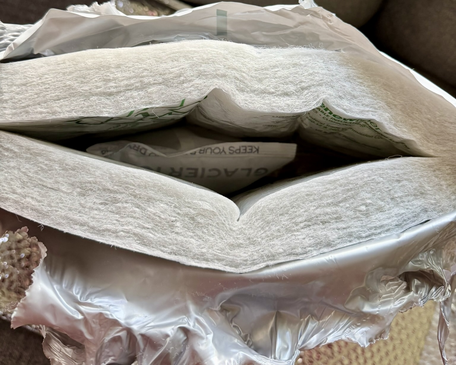 Hers insulated foil liner and fibrous insulation blanket protecting the Wegovy pen carton