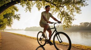 man-riding-bicycle-in-park.jpg