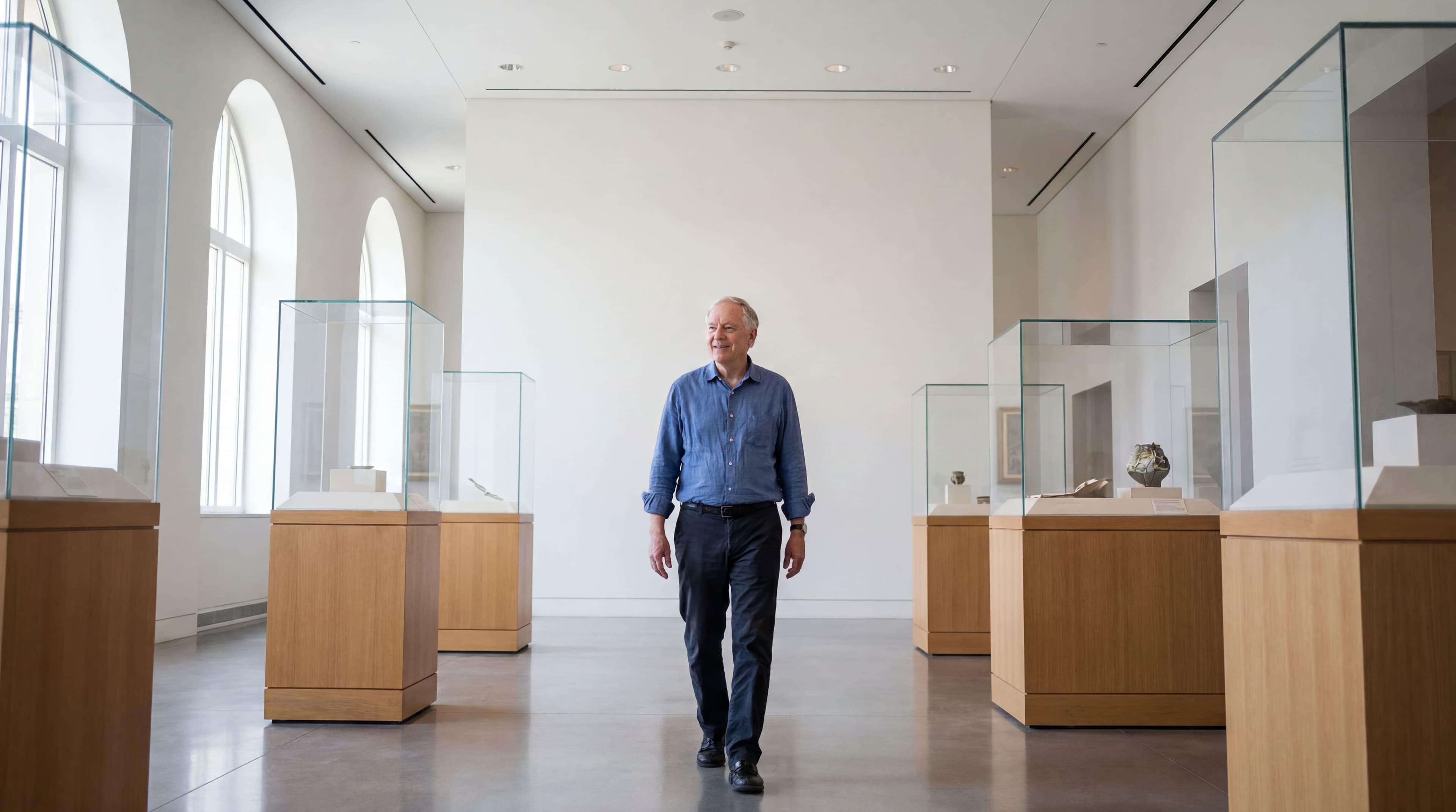 man-walking-art-gallery
