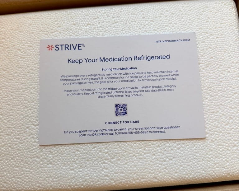 Strive Pharmacy keep your medication refrigerated card with a QR code and a connect for care line about tampering, resting on the styrofoam cooler