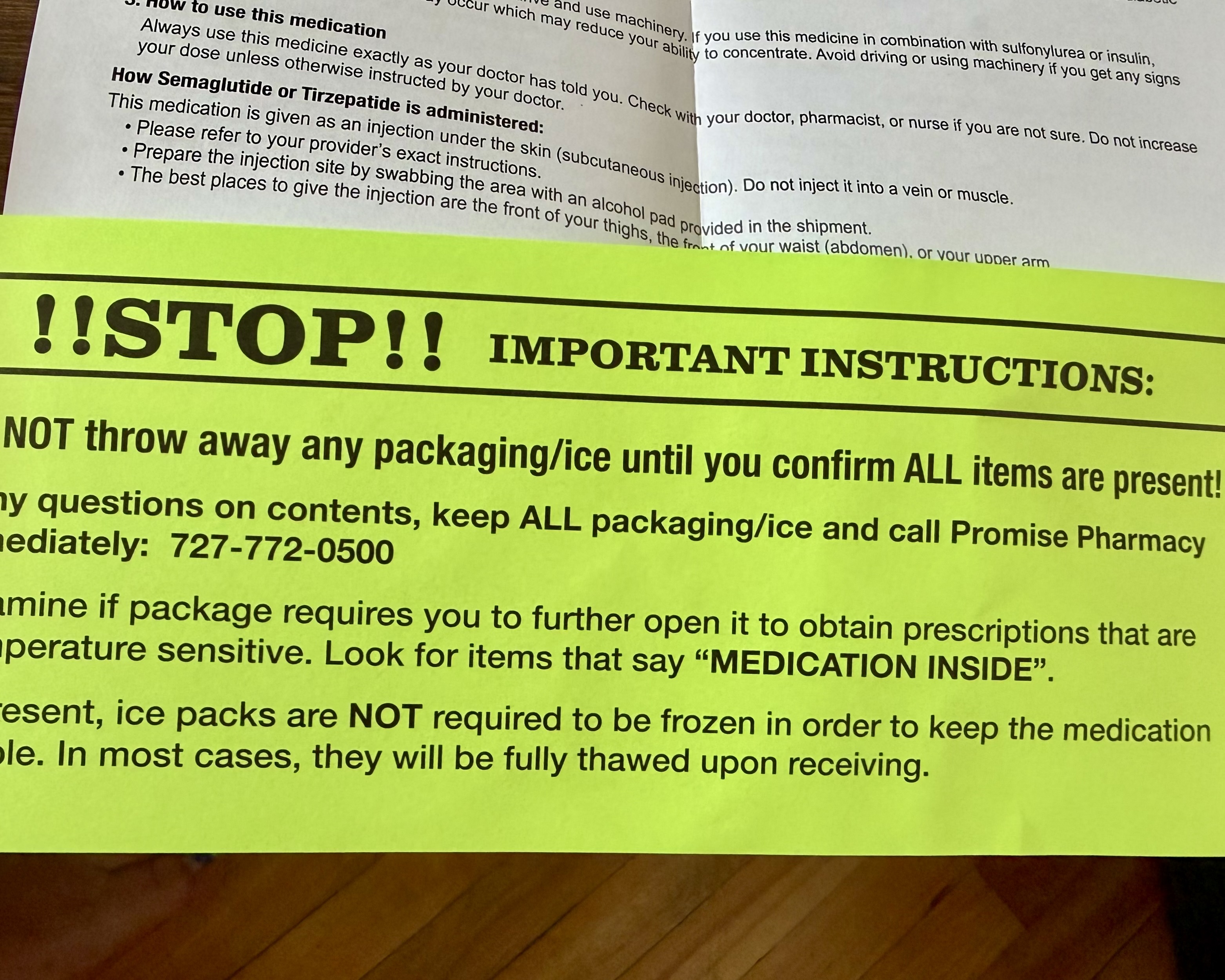 Promise Pharmacy bright yellow STOP sheet instructing patients not to discard packaging and noting ice packs are not required to be frozen