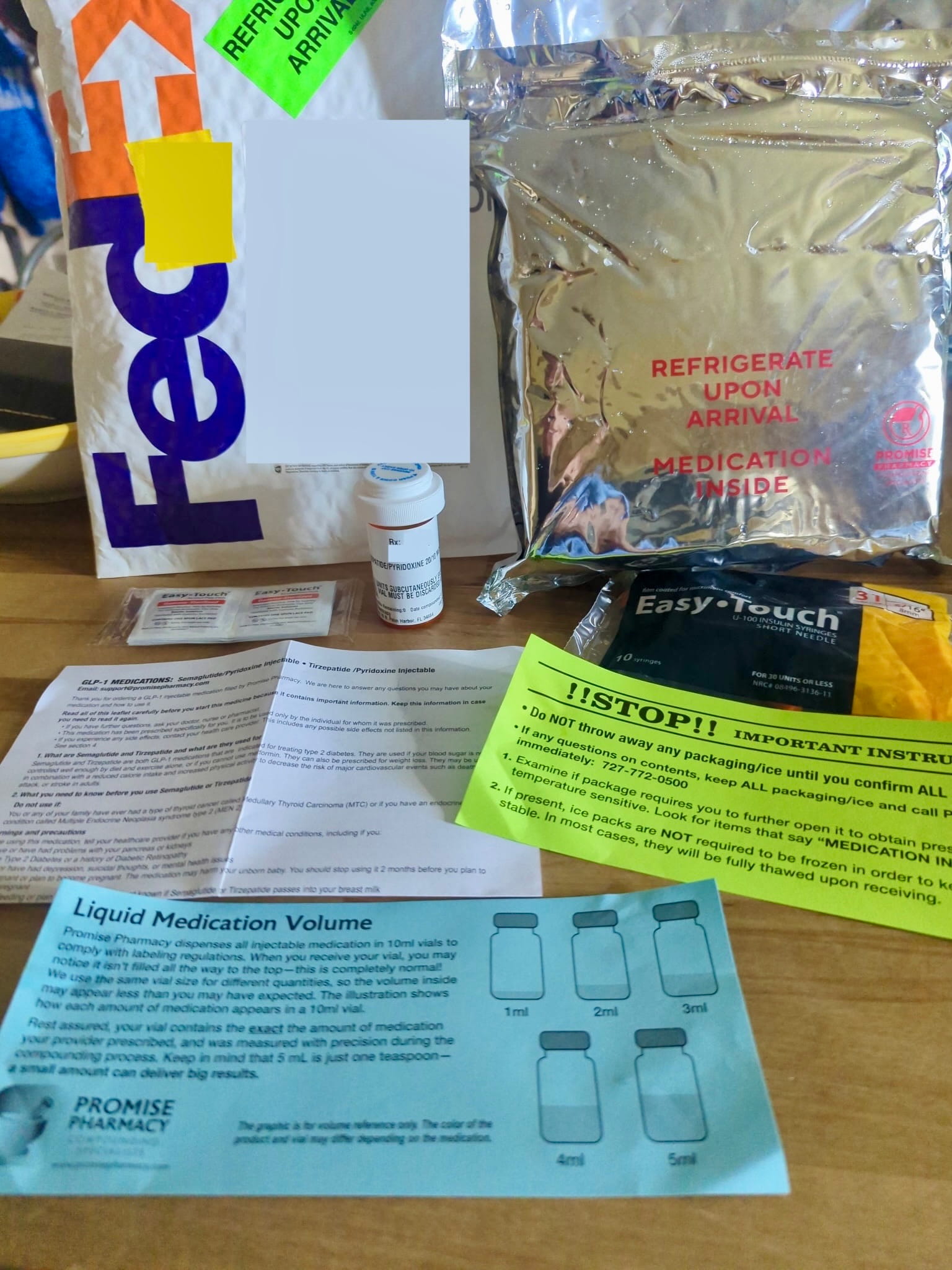 FedEx padded mailer with bright green "REFRIGERATE UPON ARRIVAL" sticker, showing discreet Trinity Meds packaging and shipping method