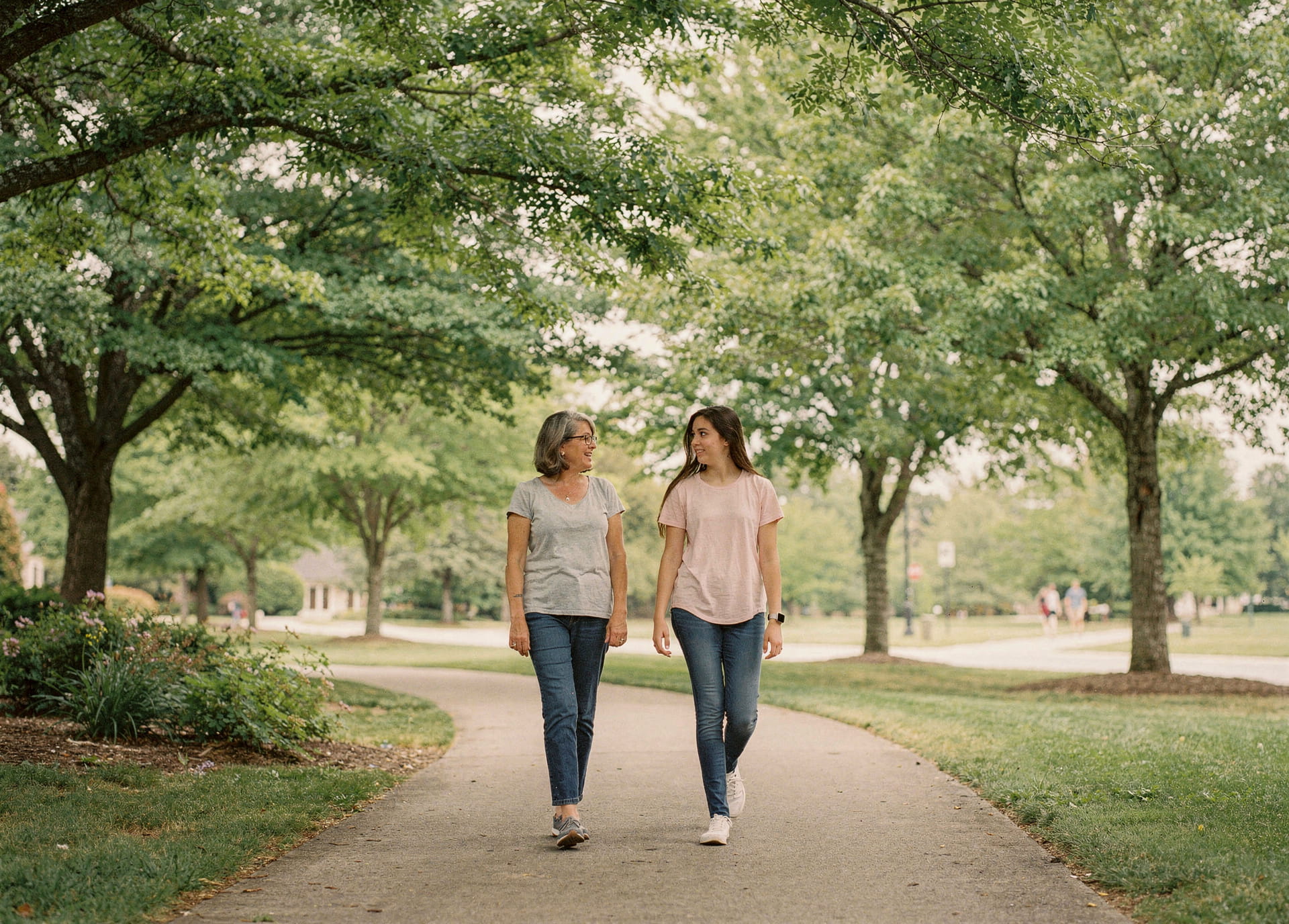 two-people-walking-in-park.jpg