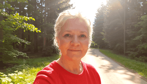 woman-hiking-along-path.png