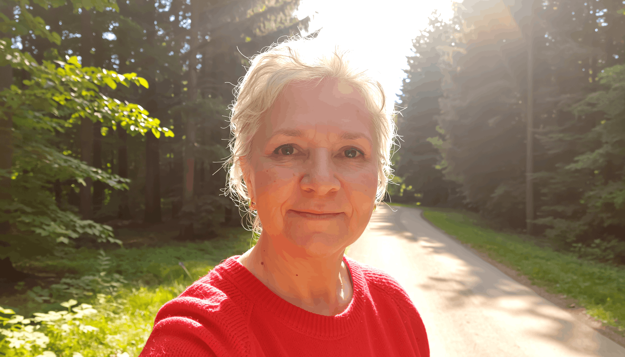 woman-hiking-along-path.png
