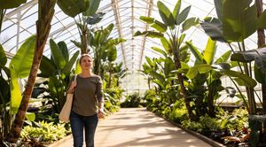 woman-walking-in-greenhouse.jpg